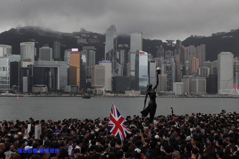 Missing British Consulate Employee Detained in China