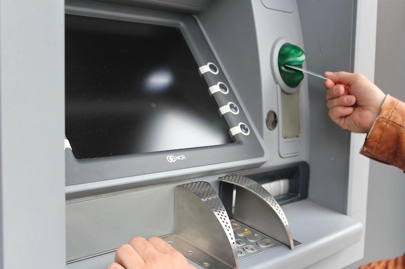 Card Being Swallowed by an ATM