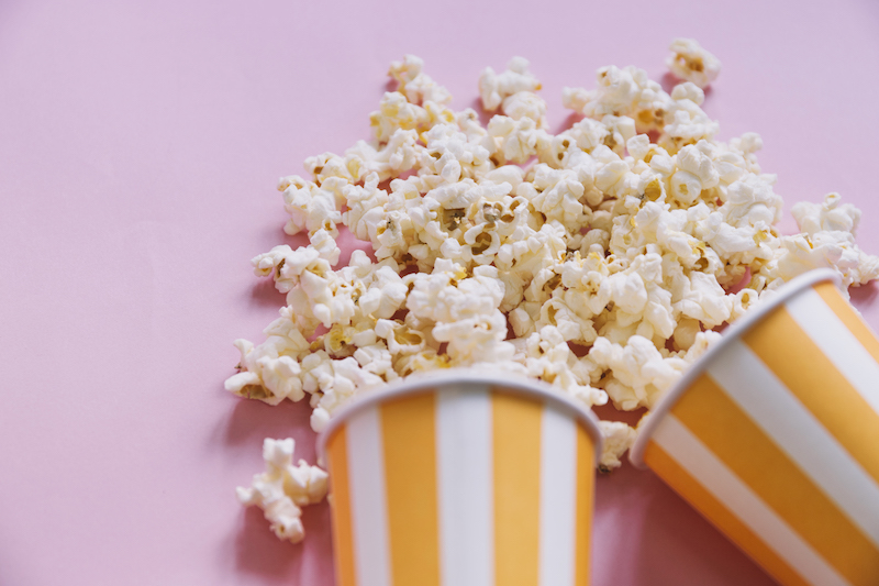 Why Do People Eat Popcorn at the Movies?